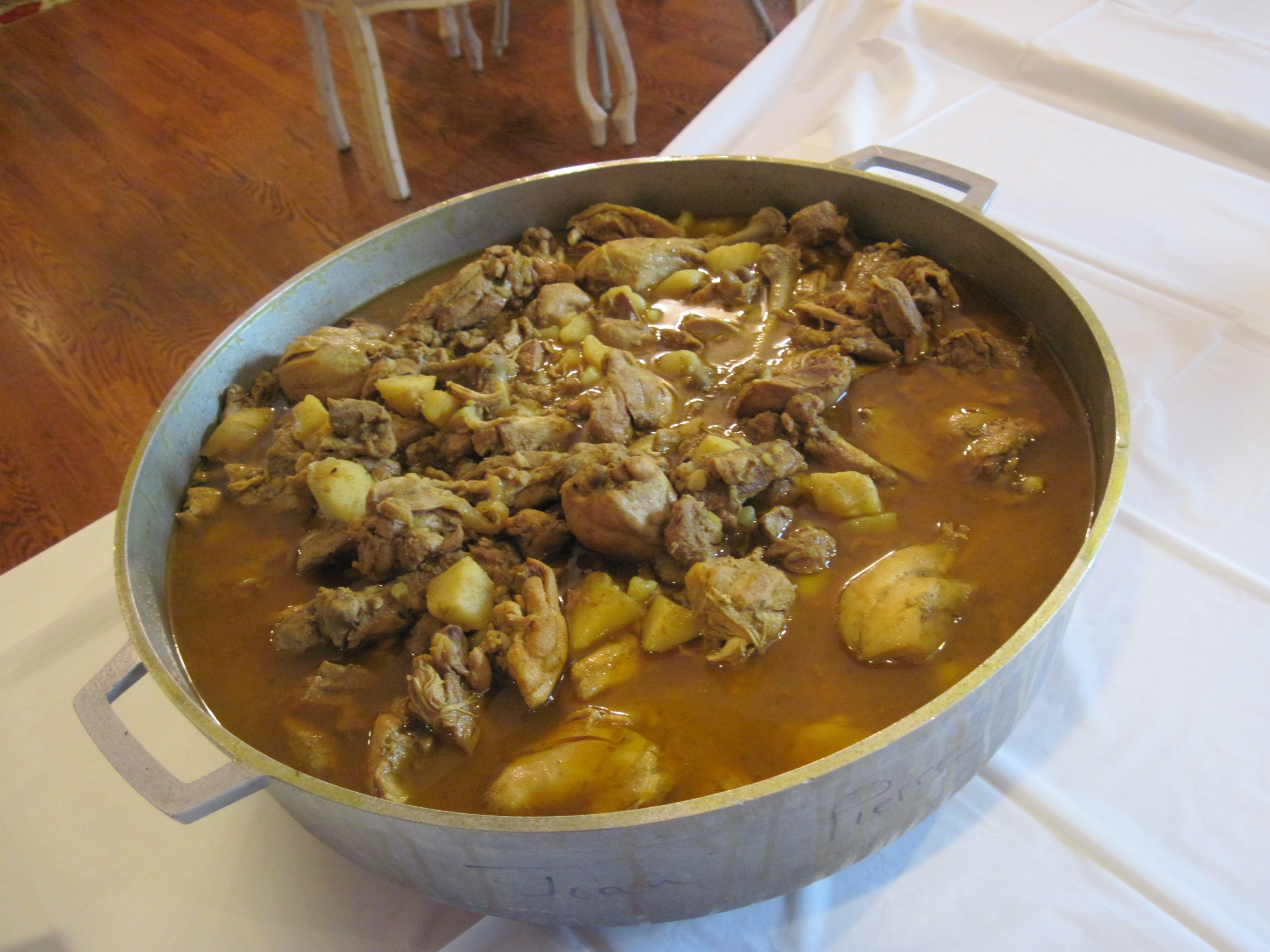 pic of Trinibago curry goat at family reunion